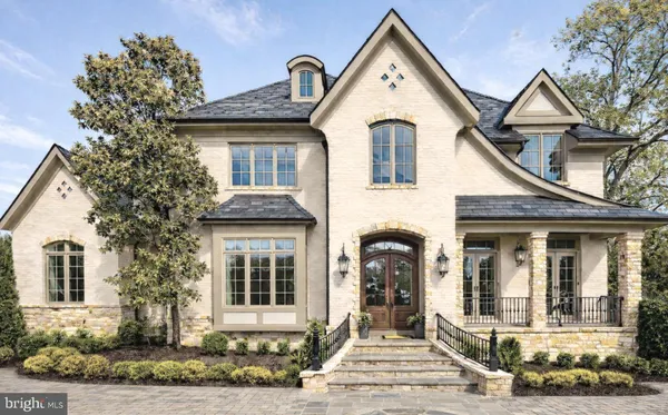 a front view of a house with a porch