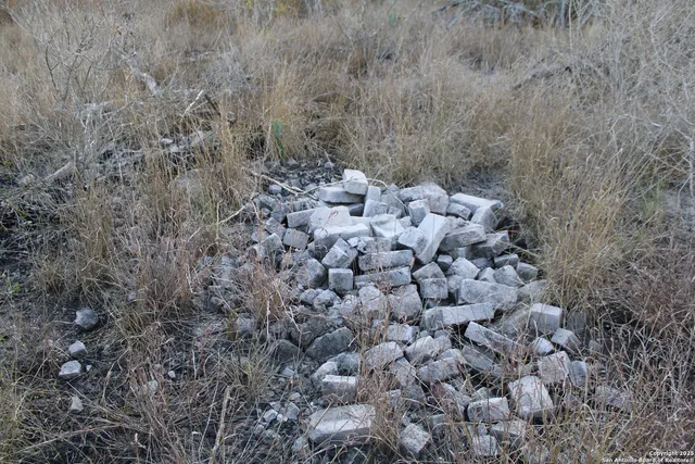 a view of a patio with table and chairs and floor