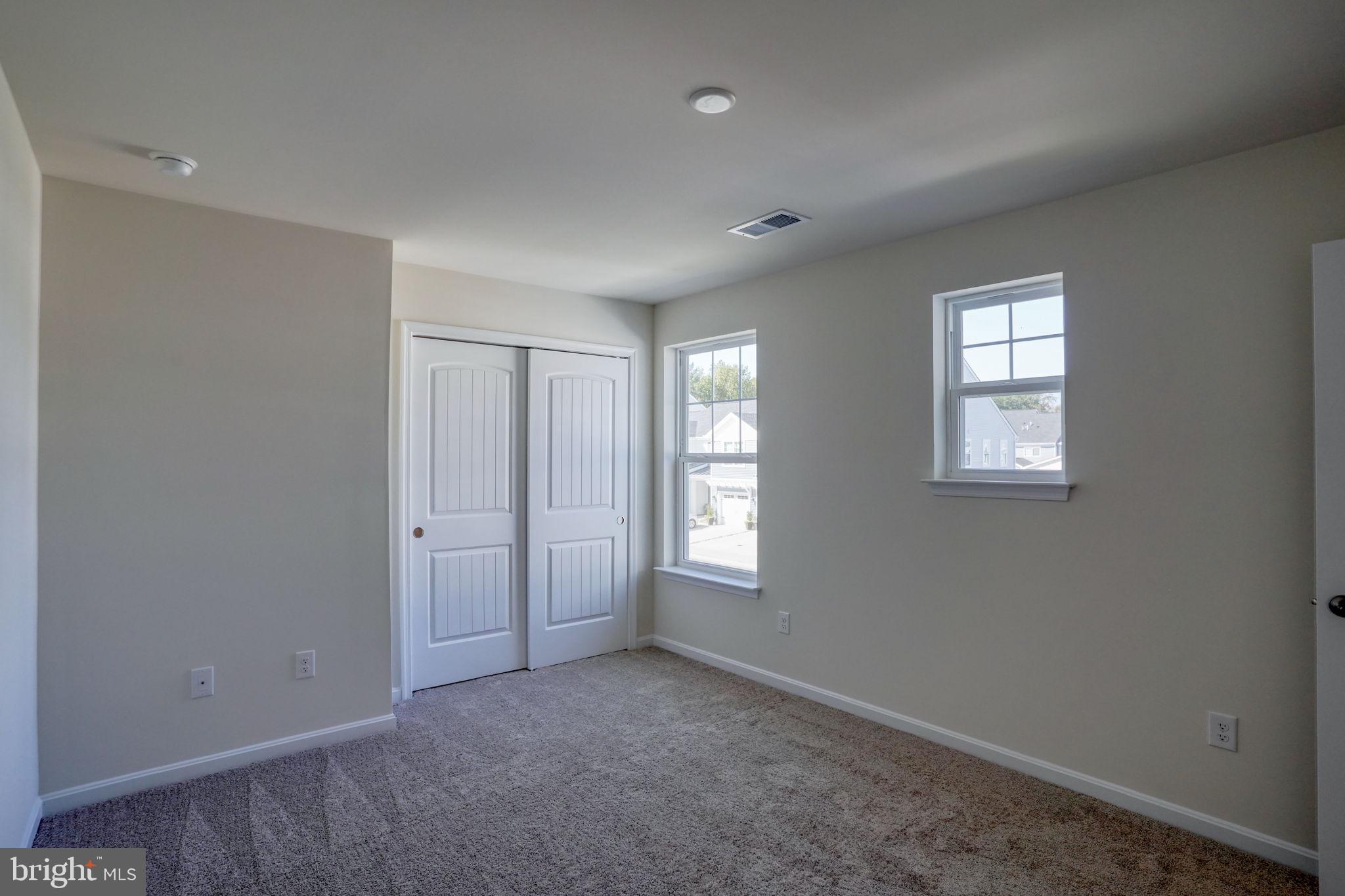 33828 Coldstream Street Frankford, DE 19945 - Photo 31 of 48 an empty room with windows