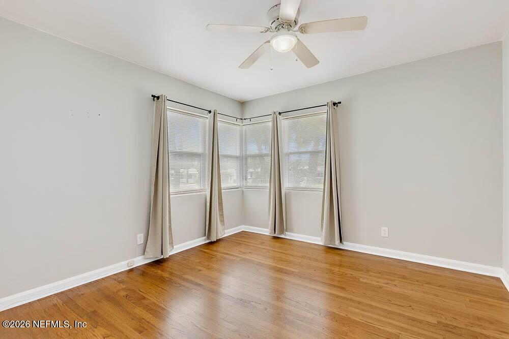 773 Wren Road Jacksonville, FL 32216 - Photo 13 of 17 a view of an empty room with wooden floor
