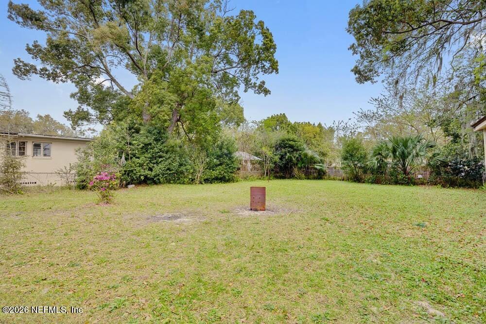 773 Wren Road Jacksonville, FL 32216 - Photo 15 of 17 a view of a yard with a tree