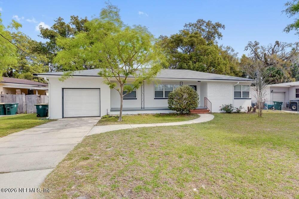 773 Wren Road Jacksonville, FL 32216 - Photo 2 of 17 a front view of a house with garden