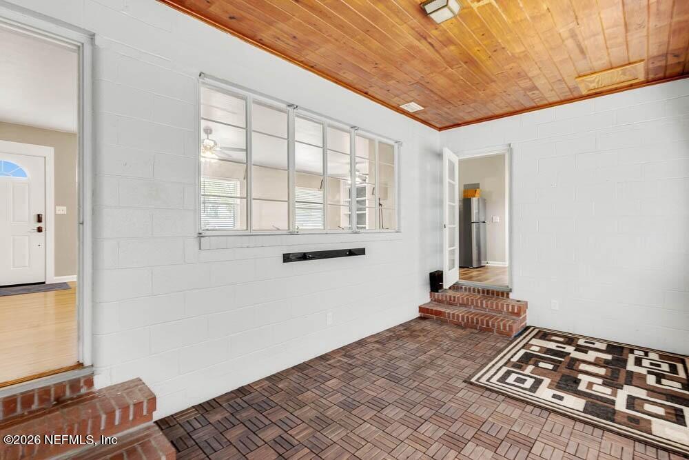 773 Wren Road Jacksonville, FL 32216 - Photo 9 of 17 an empty room with windows