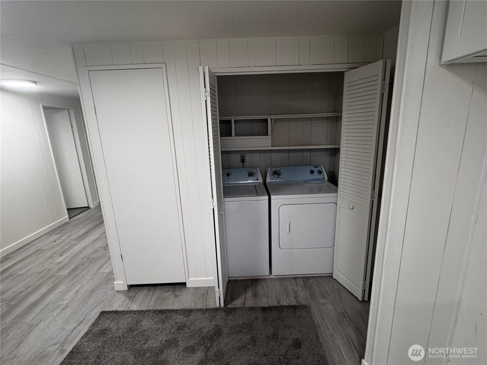 18425 Northeast 95th Street, Unit 76 Redmond, WA 98052 - Photo 16 of 20 a utility room with washing machine
