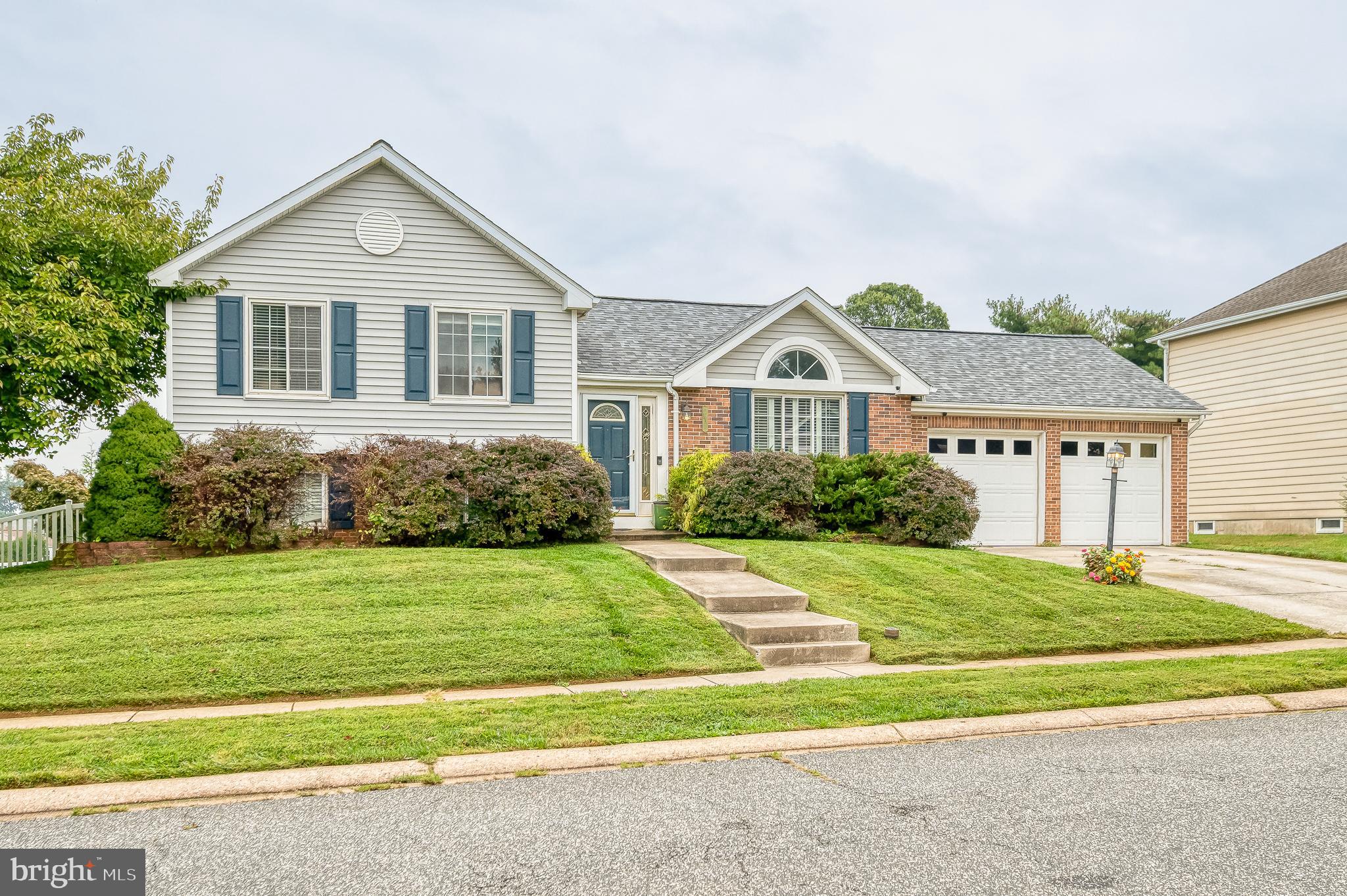 2601 Merrick Way Abingdon, MD 21009 - Photo 1 of 59 a front view of a house with a yard