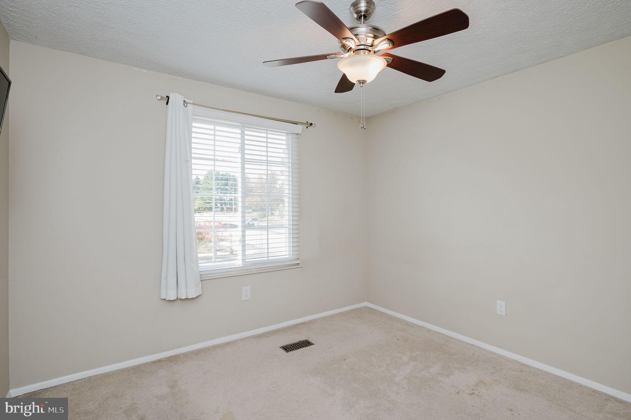 2601 Merrick Way Abingdon, MD 21009 - Photo 27 of 59 an empty room with a window and a fan