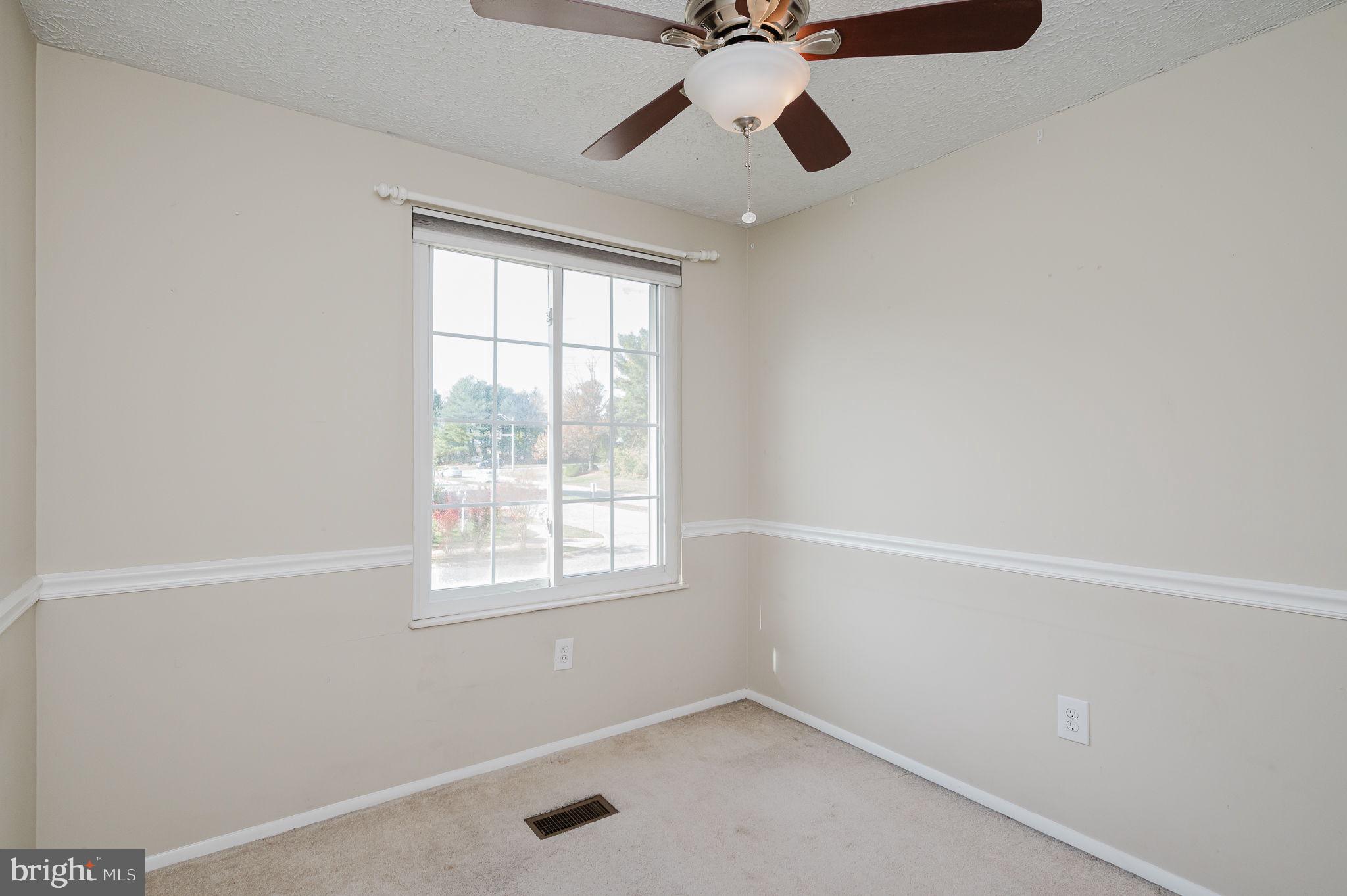 2601 Merrick Way Abingdon, MD 21009 - Photo 33 of 59 an empty room with a window and a fan