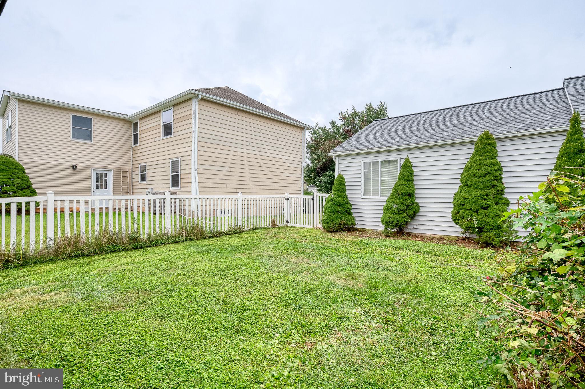 2601 Merrick Way Abingdon, MD 21009 - Photo 46 of 59 a view of a backyard with plants and large tree