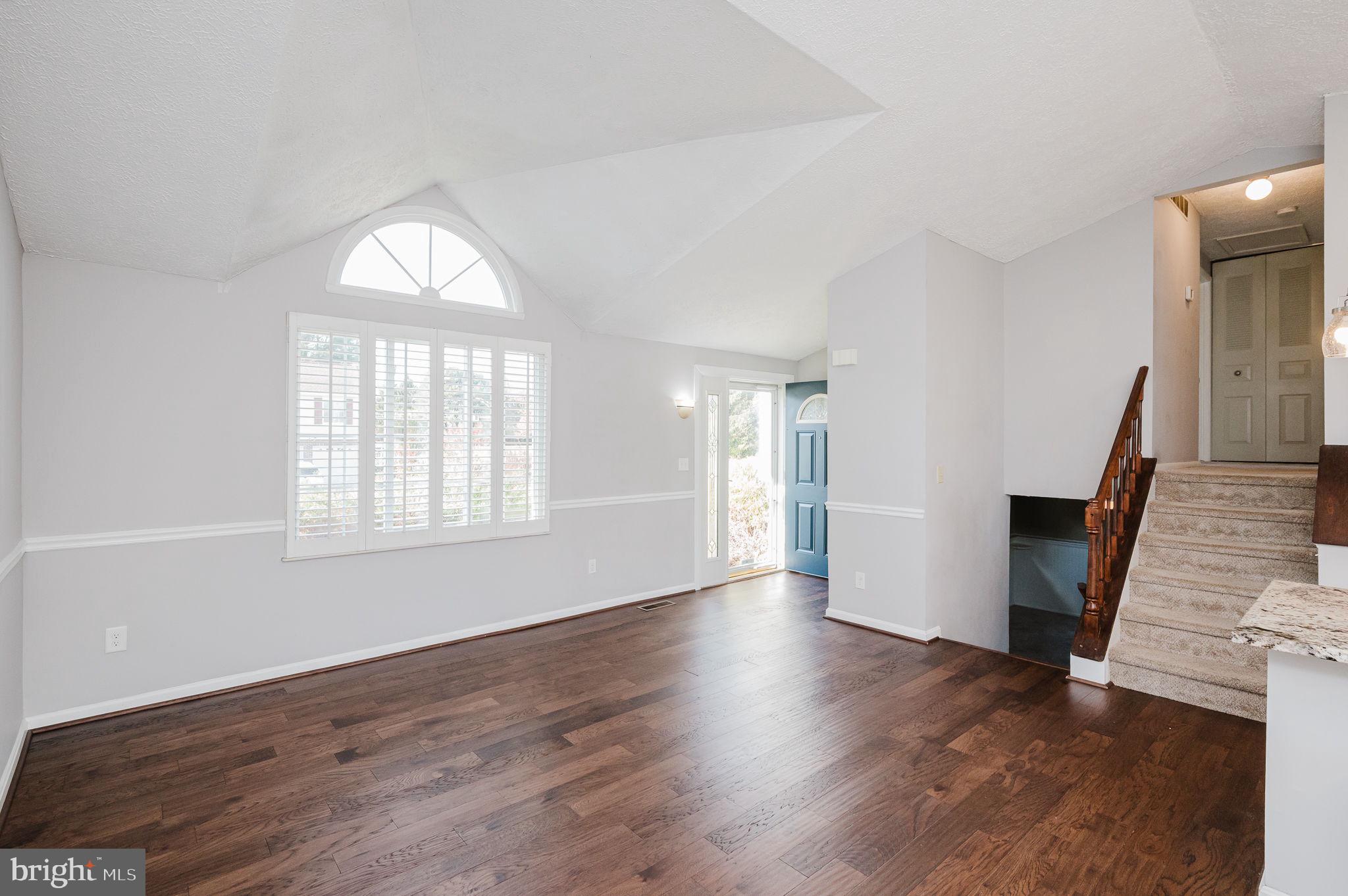 2601 Merrick Way Abingdon, MD 21009 - Photo 5 of 59 an empty room with wooden floor and windows