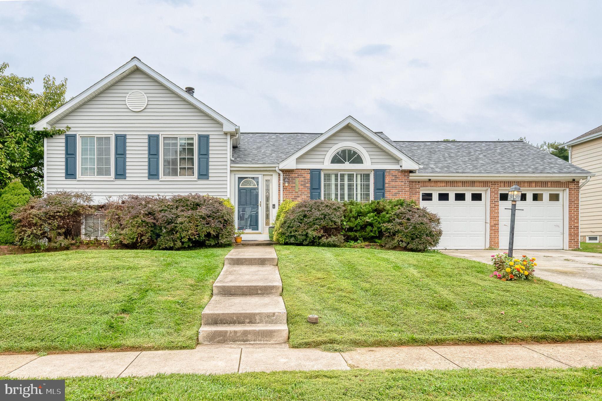 2601 Merrick Way Abingdon, MD 21009 - Photo 56 of 59 a front view of a house with a yard