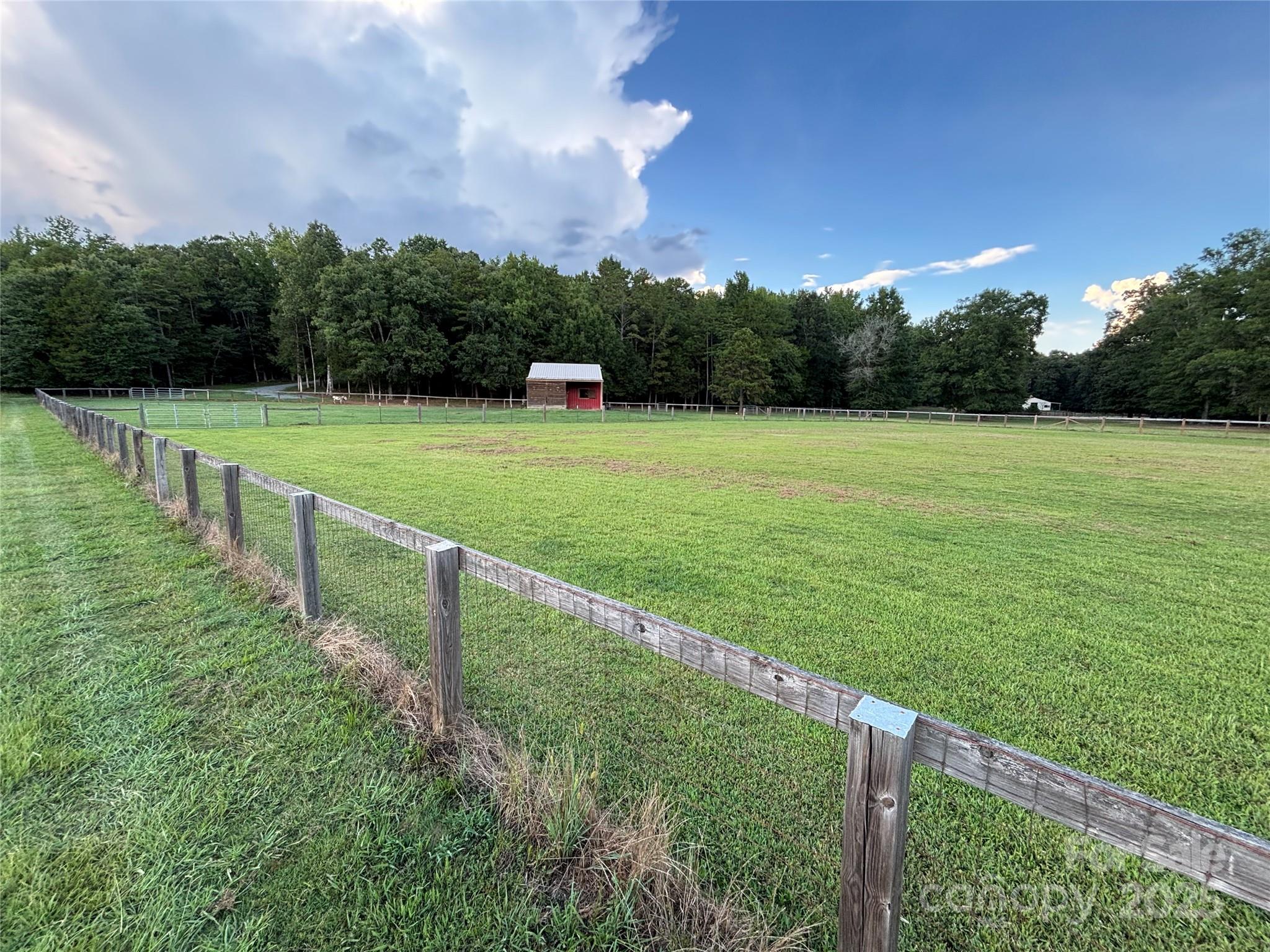 0 Maggie Robinson Road Waxhaw, NC 28173 - Photo 22 of 42 a view of a golf course with a garden