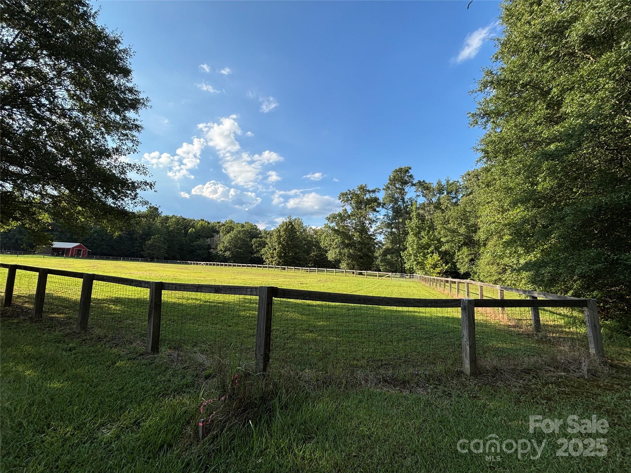 0 Maggie Robinson Road Waxhaw, NC 28173 - Photo 23 of 42 a view of a yard with a bench