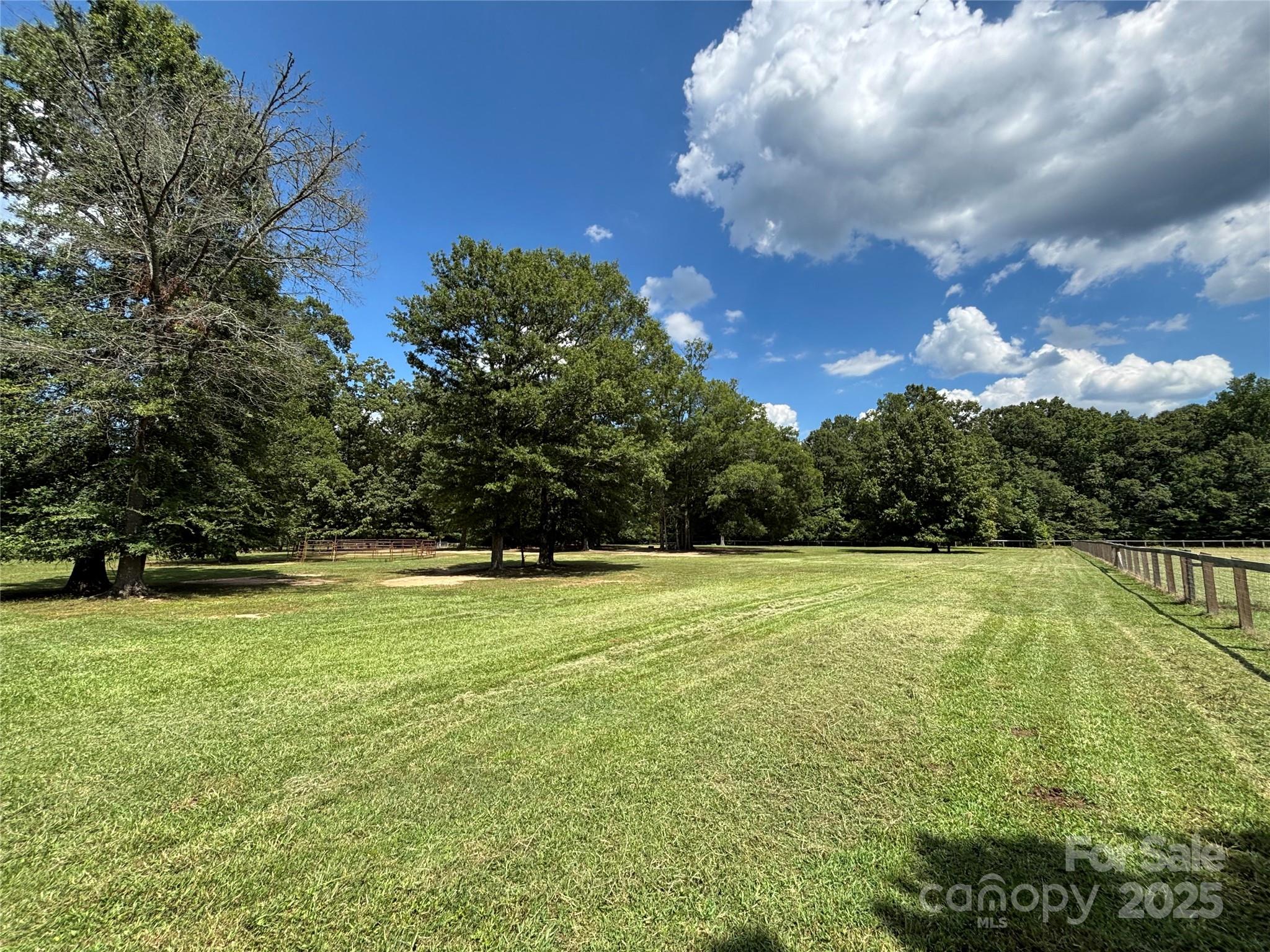 0 Maggie Robinson Road Waxhaw, NC 28173 - Photo 4 of 42 a view of a field with an trees