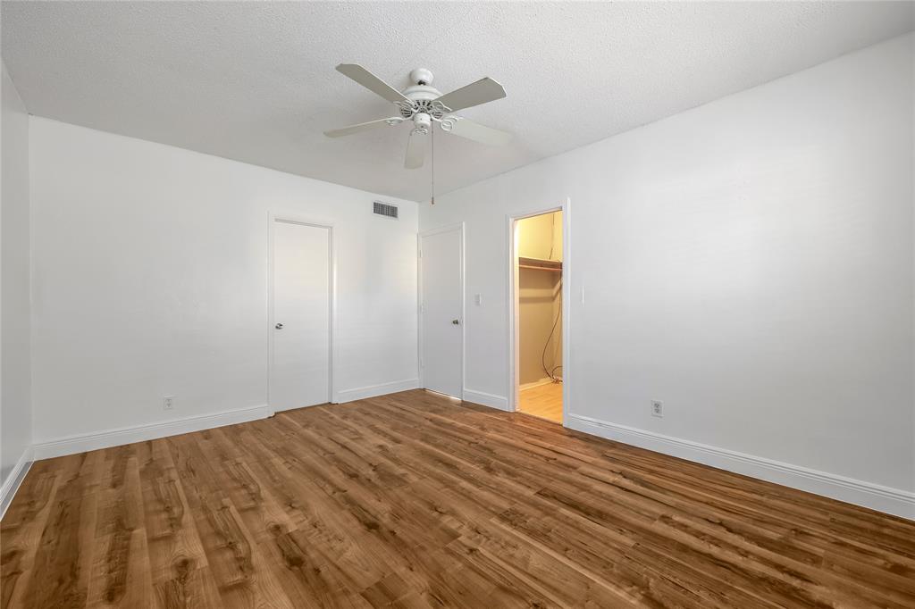 280 South Cypress Road, Unit 306 Pompano Beach, FL 33060 - Photo 12 of 17 wooden floor in an empty room