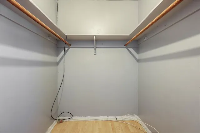 a view of a room with racks on the wall