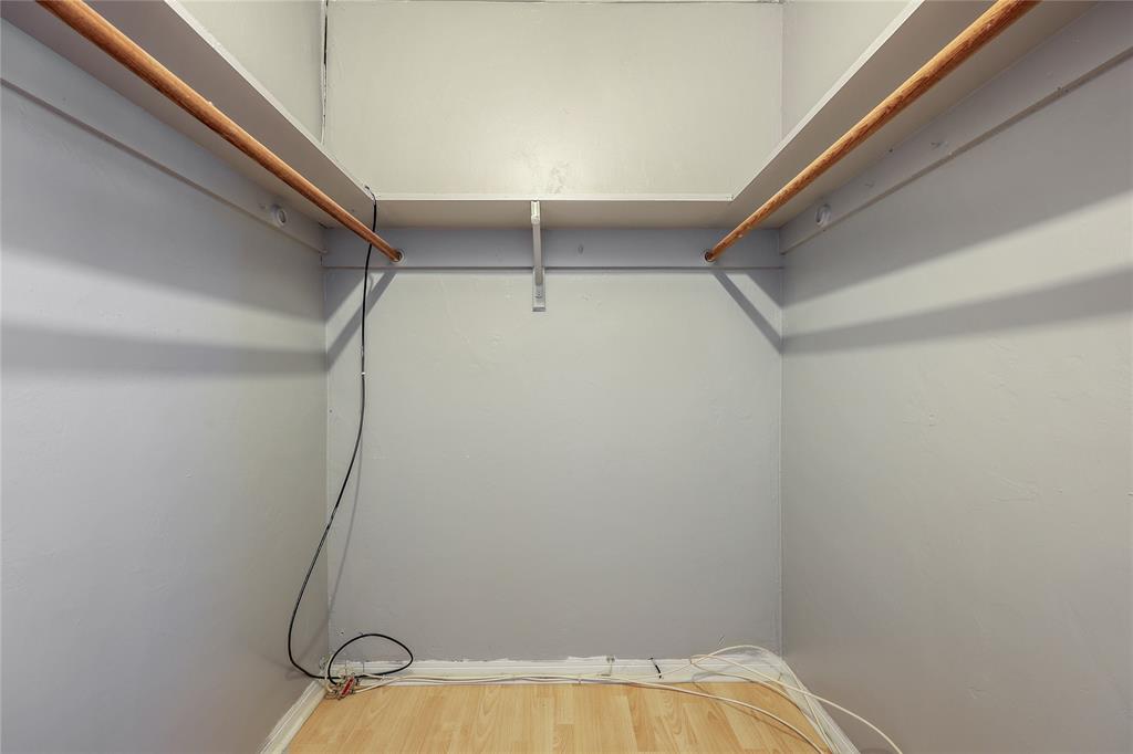 280 South Cypress Road, Unit 306 Pompano Beach, FL 33060 - Photo 14 of 17 a view of a room with racks on the wall