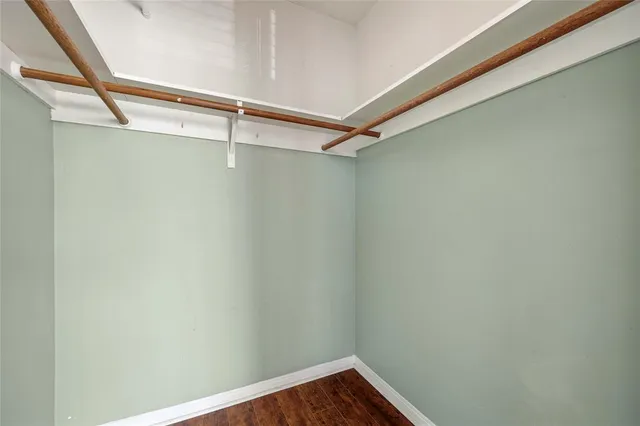 a view of a room with racks on the wall