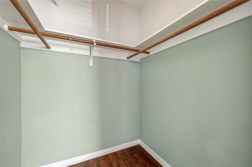 280 South Cypress Road, Unit 306 Pompano Beach, FL 33060 - Photo 9 of 17 a view of a room with racks on the wall