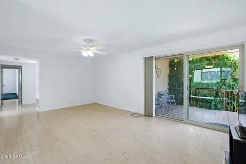 a view of a livingroom with wooden floor