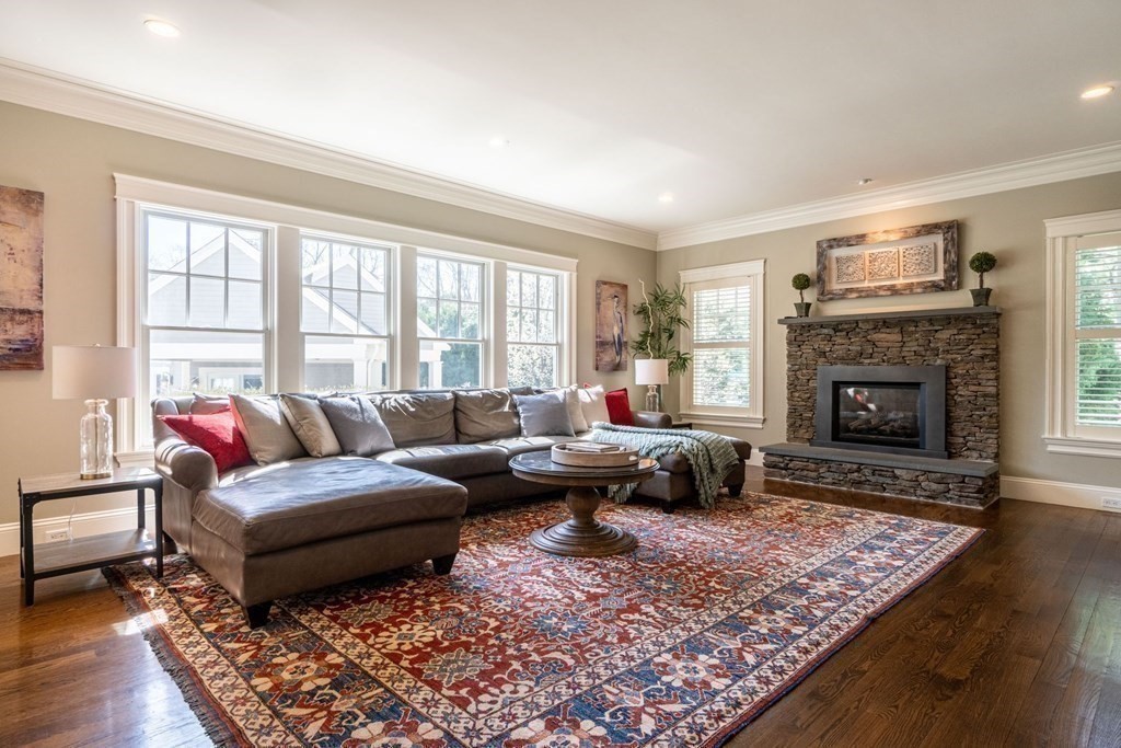 99 Country Way Needham, MA 02492 - Photo 14 of 42 a living room with furniture and a fireplace
