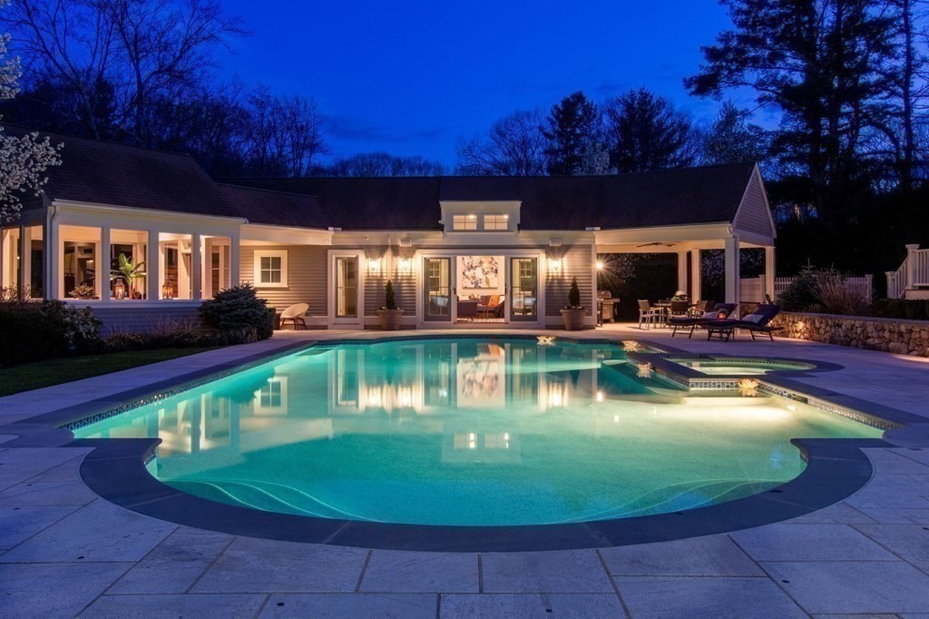 99 Country Way Needham, MA 02492 - Photo 2 of 42 a view of a house with swimming pool