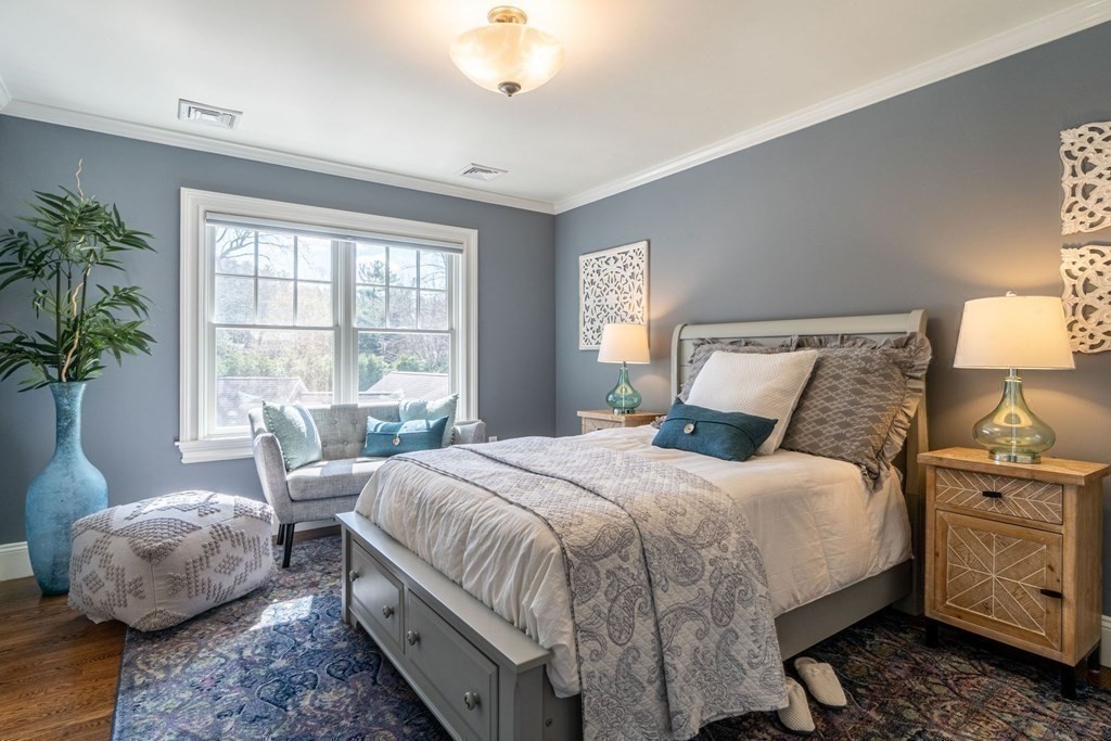 99 Country Way Needham, MA 02492 - Photo 25 of 42 a bedroom with a large bed and a window
