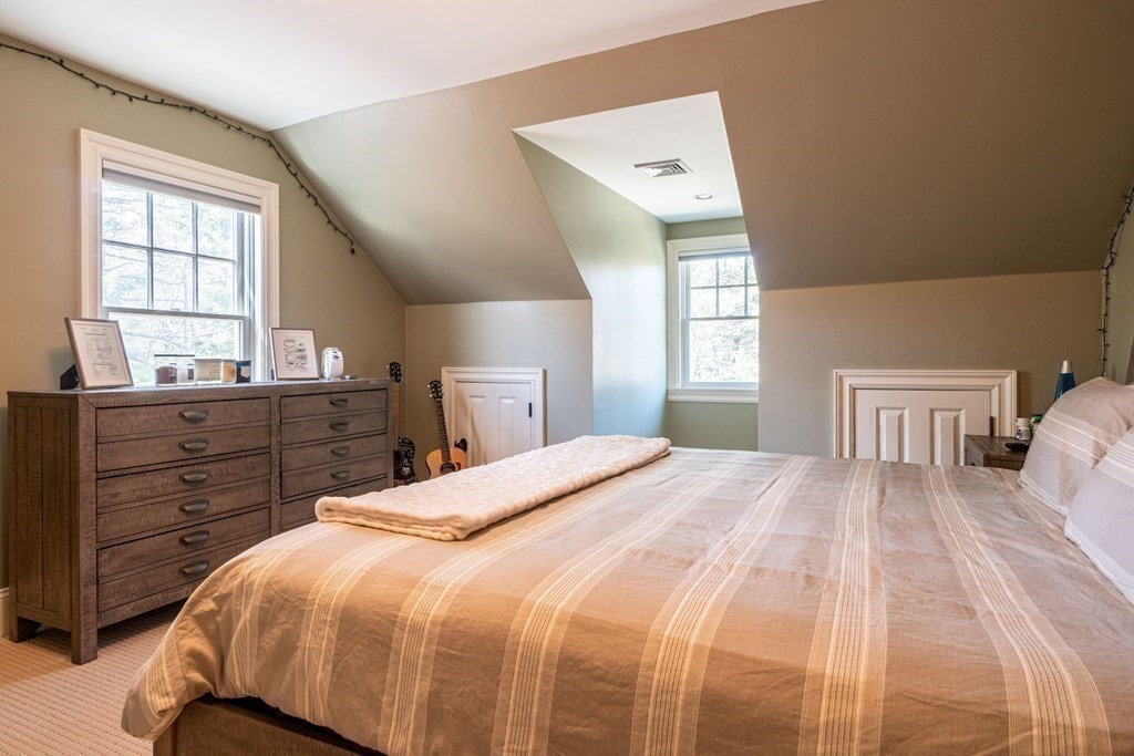 99 Country Way Needham, MA 02492 - Photo 29 of 42 a bedroom with a large bed and a window