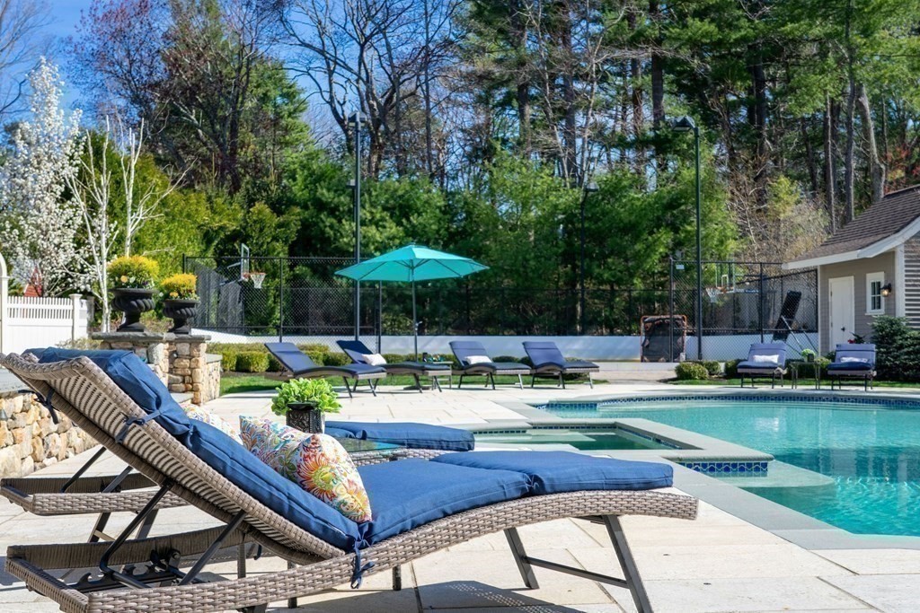 99 Country Way Needham, MA 02492 - Photo 37 of 42 a view of swimming pool with outdoor seating swimming pool and green space