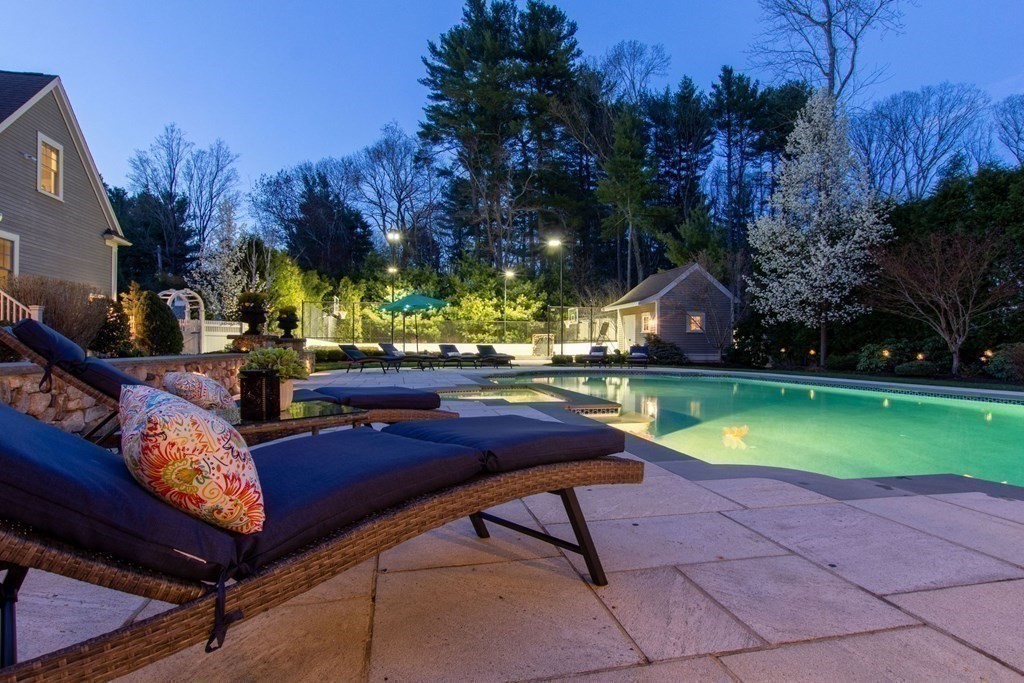 99 Country Way Needham, MA 02492 - Photo 40 of 42 a swimming pool with outdoor seating and yard