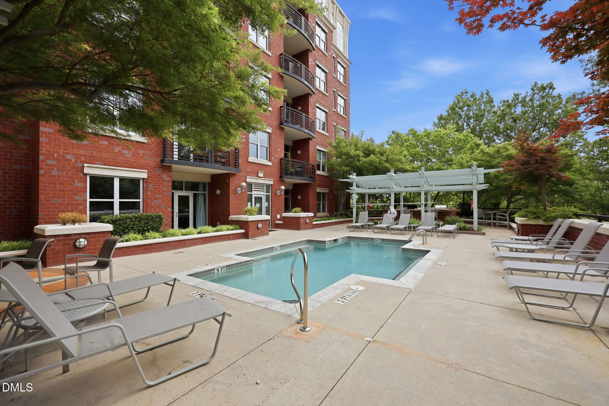 618 North Boylan Avenue, Unit 718 Raleigh, NC 27603 - Photo 25 of 38 a view of a patio with a table and chairs