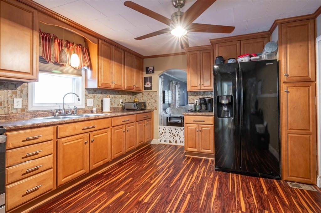 7 Field Avenue Methuen, MA 01844 - Photo 13 of 24 a kitchen with a refrigerator wooden floor and a sink