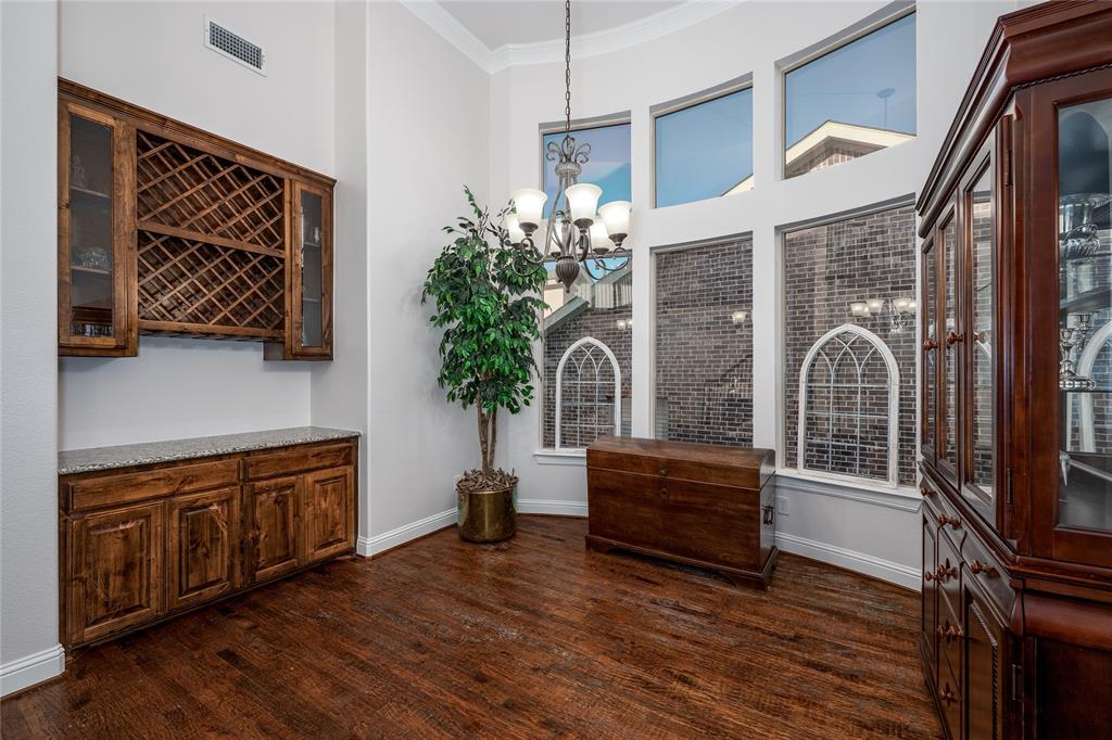 309 Bachman Creek Drive McKinney, TX 75072 - Photo 12 of 37 a living room with furniture and a fireplace