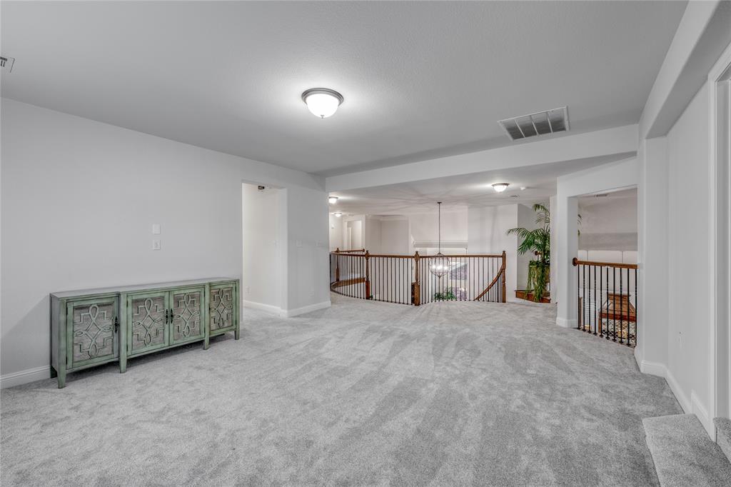 309 Bachman Creek Drive McKinney, TX 75072 - Photo 22 of 37 a view of an empty room