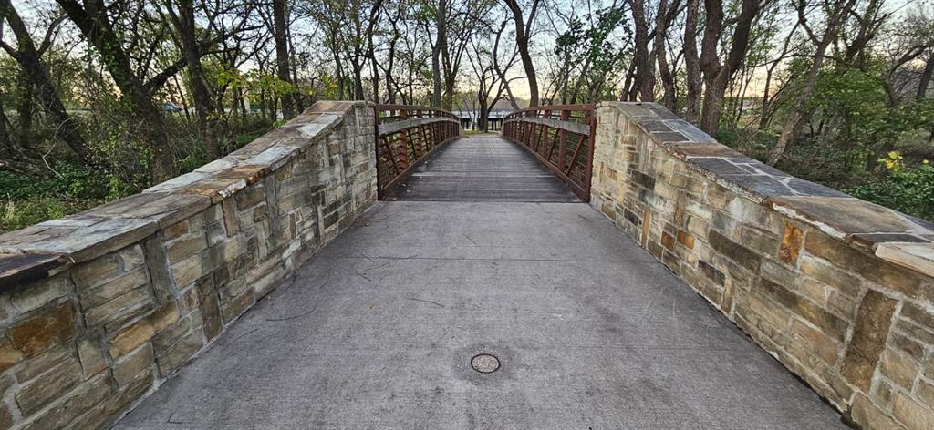 309 Bachman Creek Drive McKinney, TX 75072 - Photo 36 of 37 a view of pathway along with wooden stairs