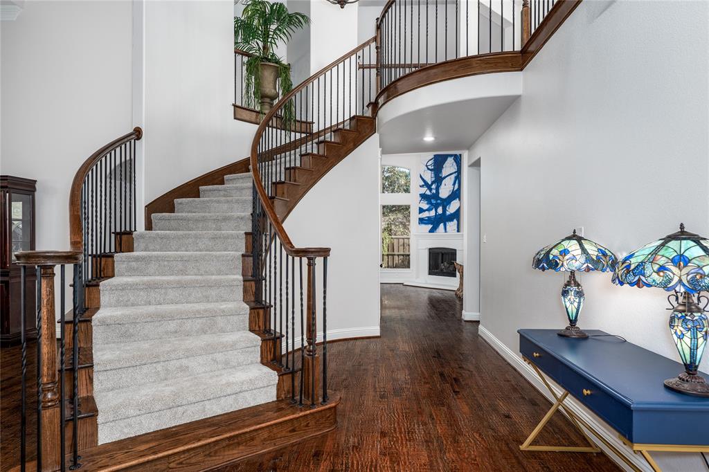 309 Bachman Creek Drive McKinney, TX 75072 - Photo 5 of 37 a view of entryway and hall with wooden floor
