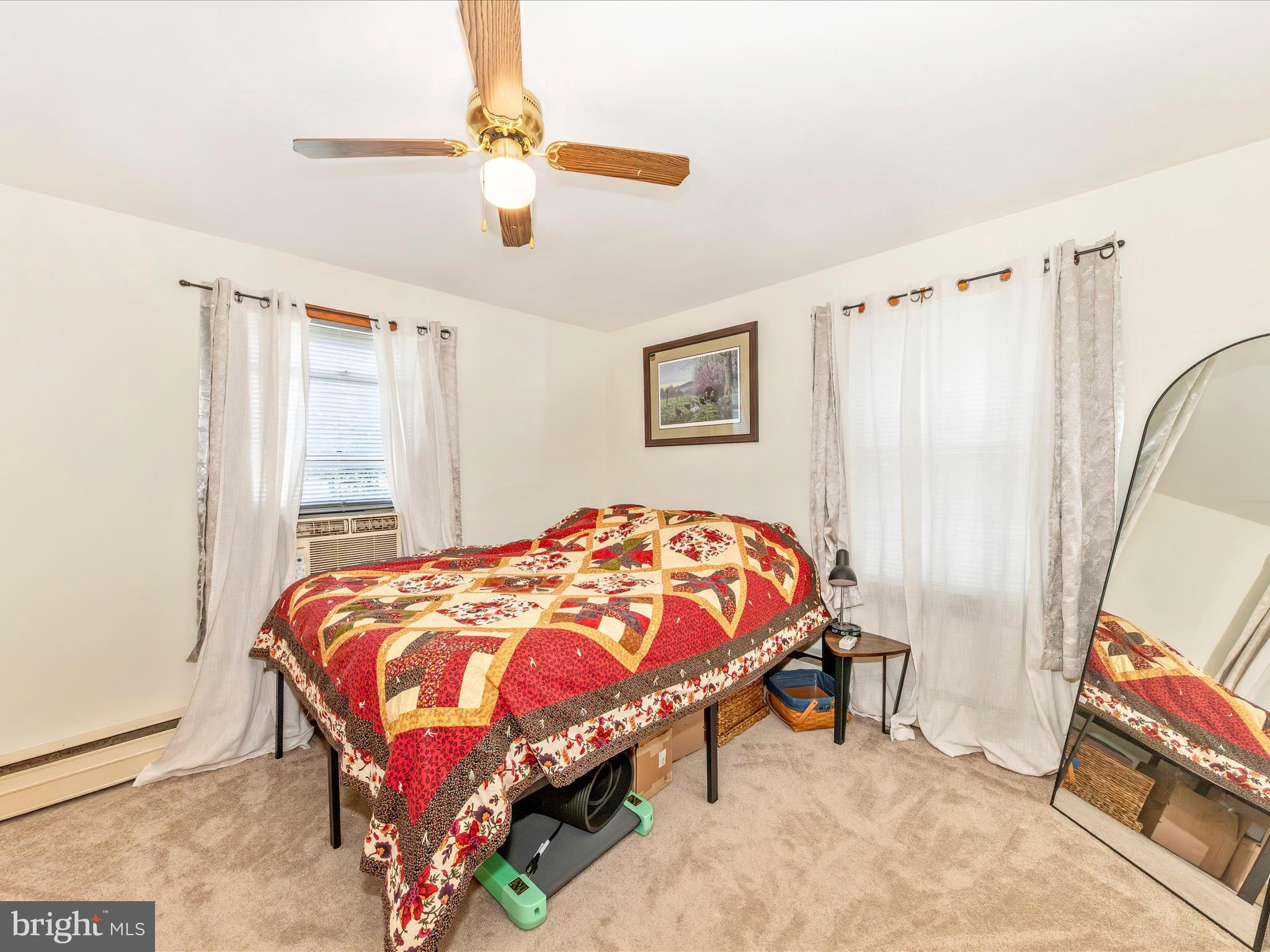 14021 Broadfording Church Road Hagerstown, MD 21740 - Photo 13 of 46 a bedroom with a bed and a window
