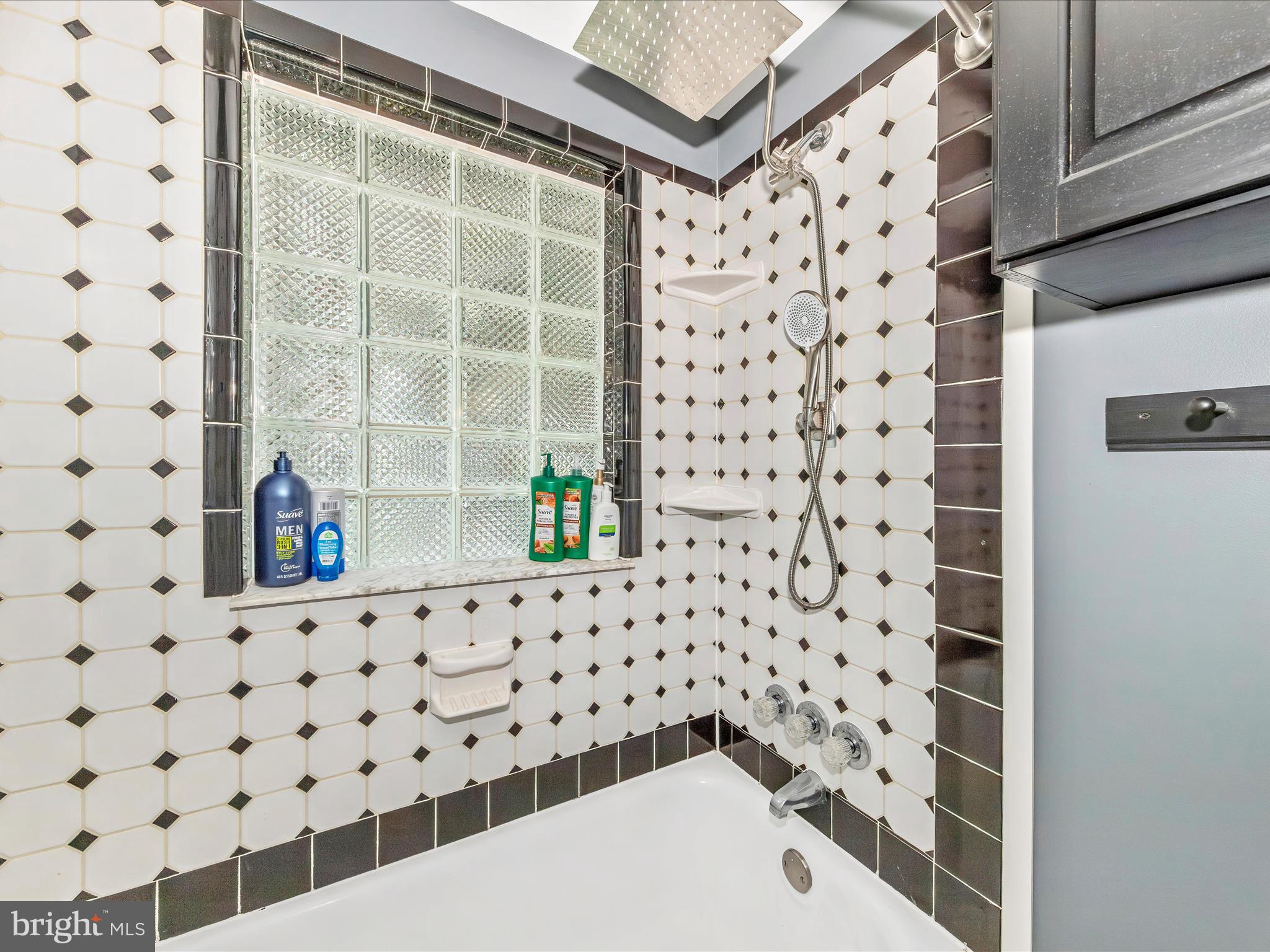 14021 Broadfording Church Road Hagerstown, MD 21740 - Photo 21 of 46 a bathroom with a shower and a sink