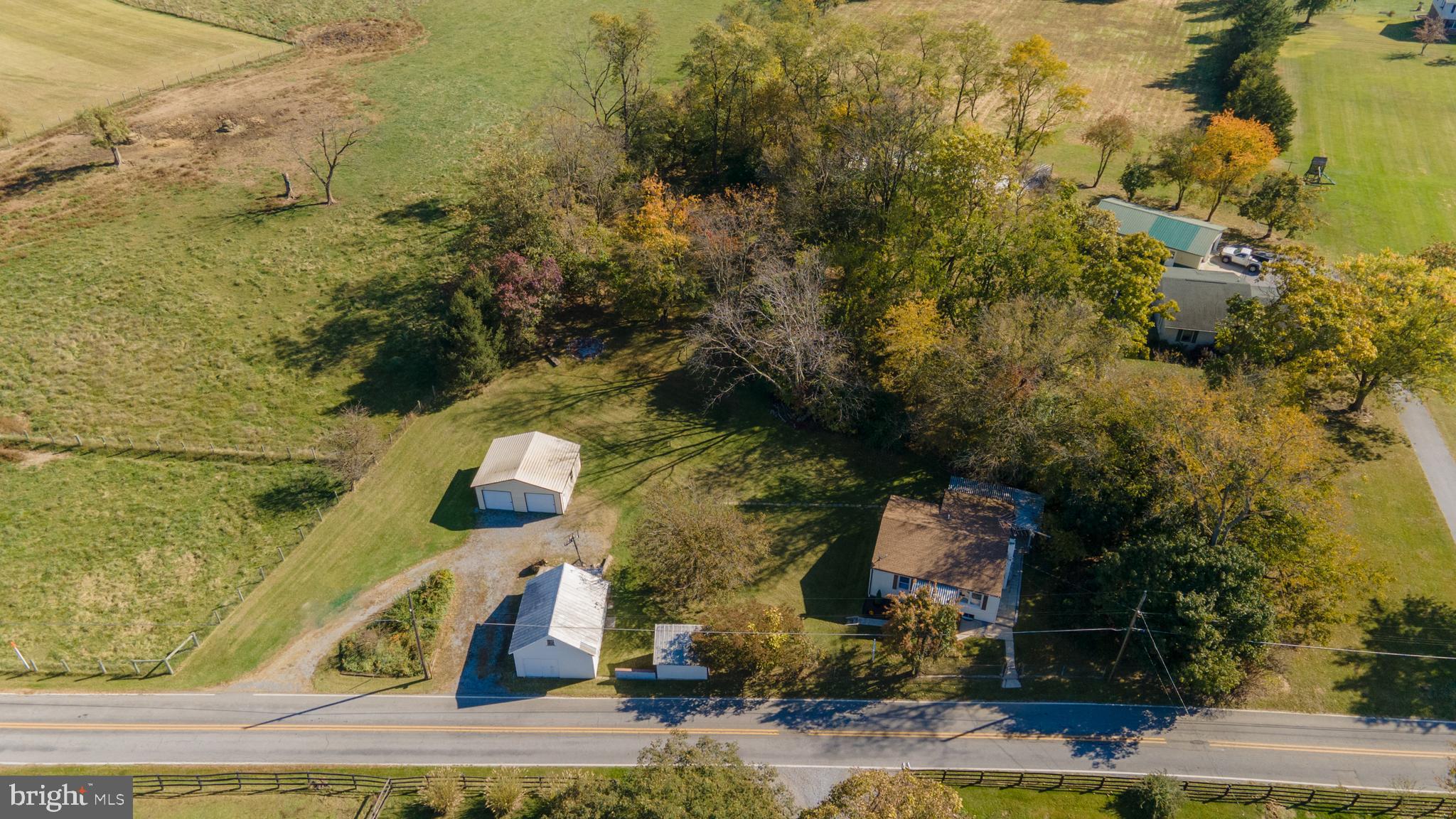 14021 Broadfording Church Road Hagerstown, MD 21740 - Photo 3 of 46 an aerial view of a house with swimming pool