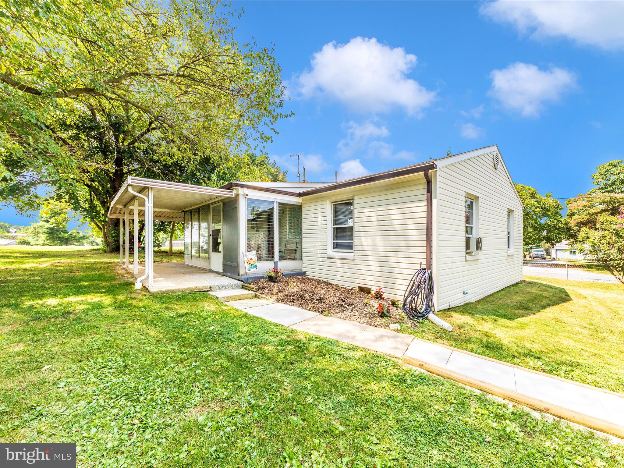 14021 Broadfording Church Road Hagerstown, MD 21740 - Photo 39 of 46 a view of a house with a yard