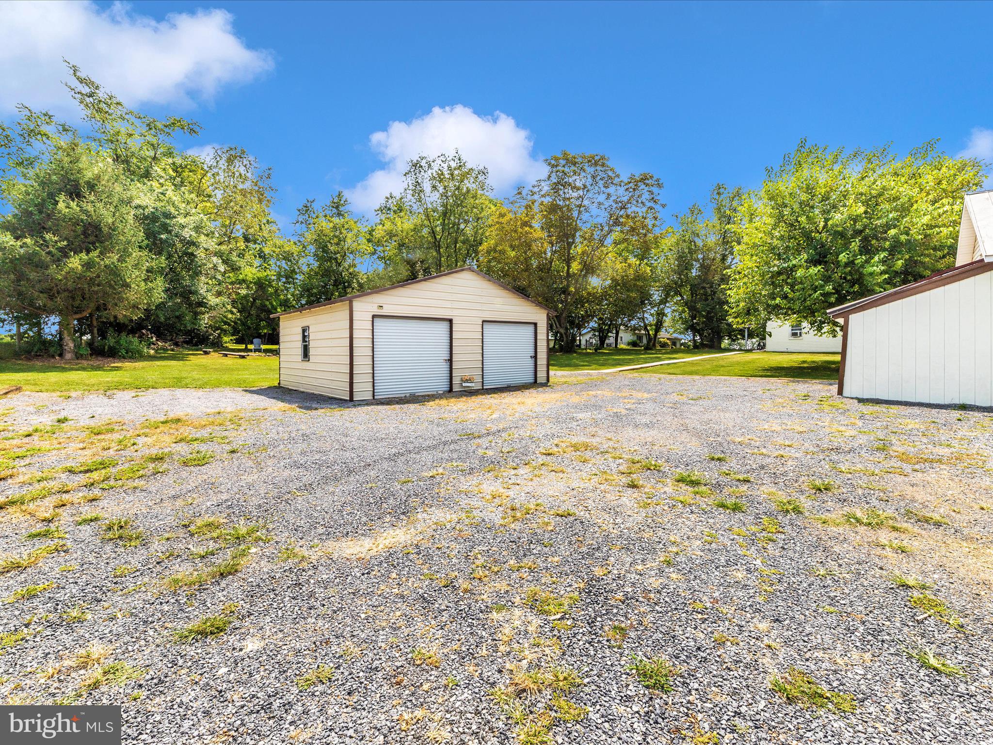 14021 Broadfording Church Road Hagerstown, MD 21740 - Photo 43 of 46 a view of a house with a yard