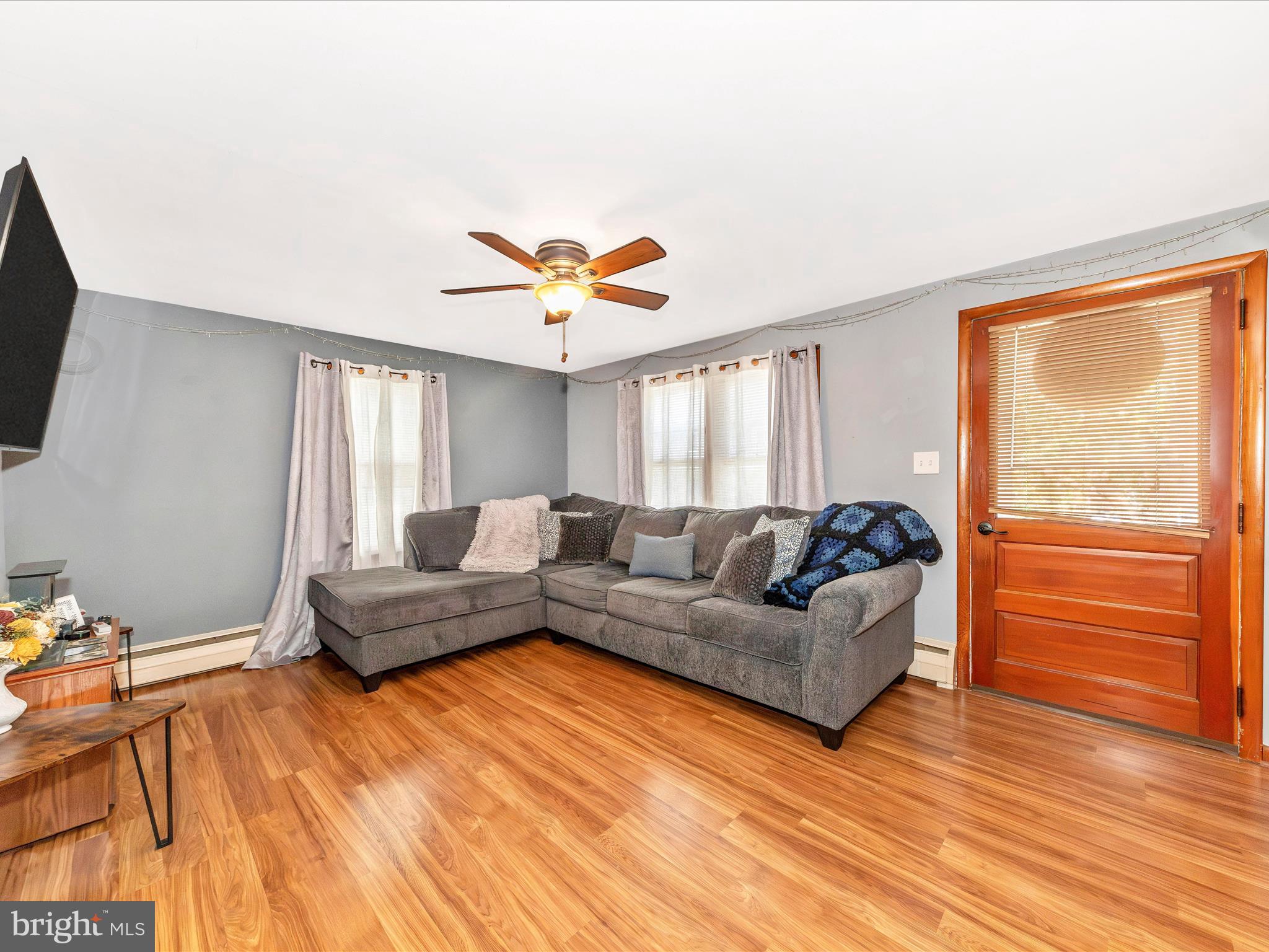 14021 Broadfording Church Road Hagerstown, MD 21740 - Photo 5 of 46 a living room with furniture and a large window