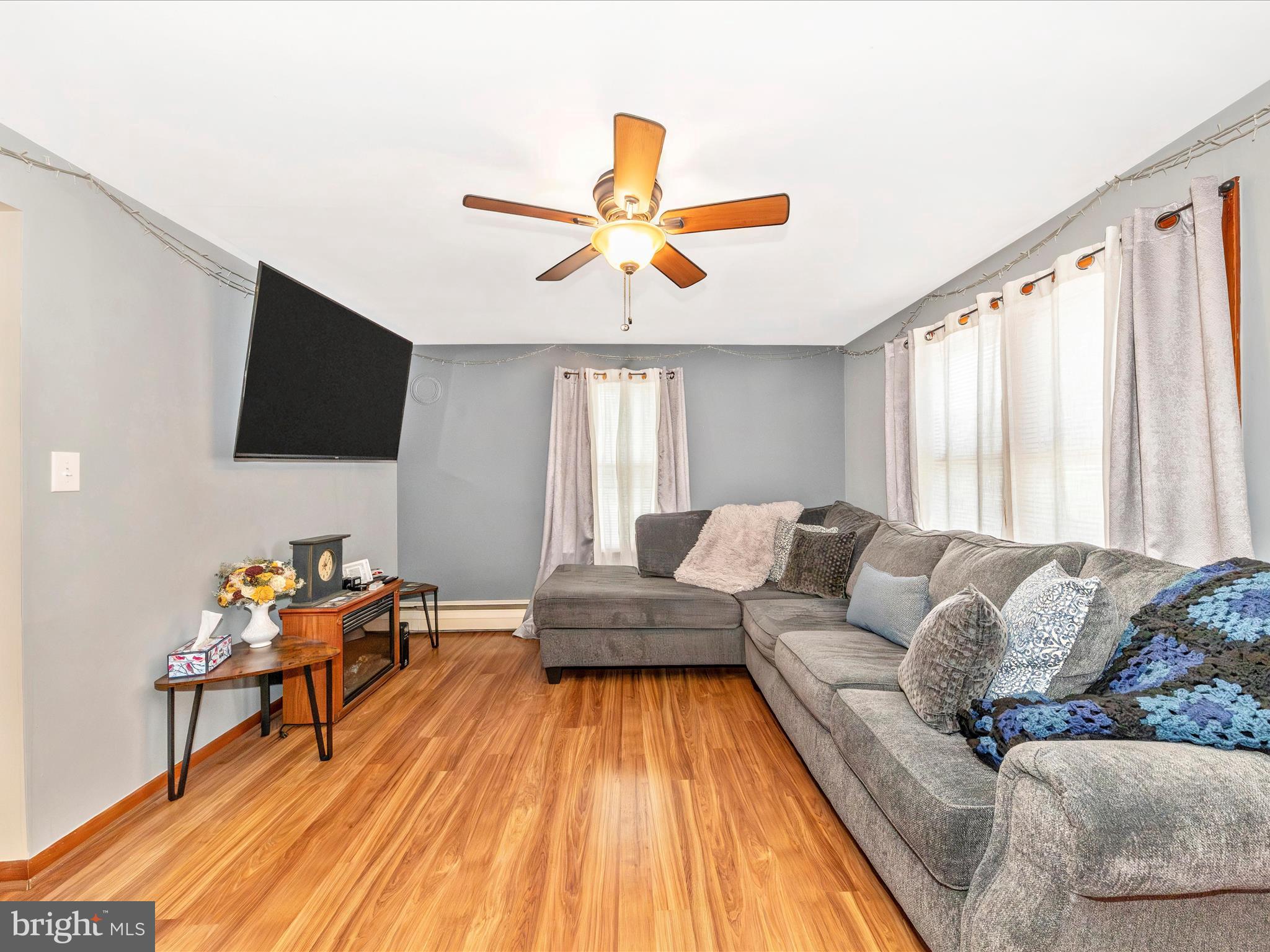 14021 Broadfording Church Road Hagerstown, MD 21740 - Photo 6 of 46 a living room with furniture and a flat screen tv