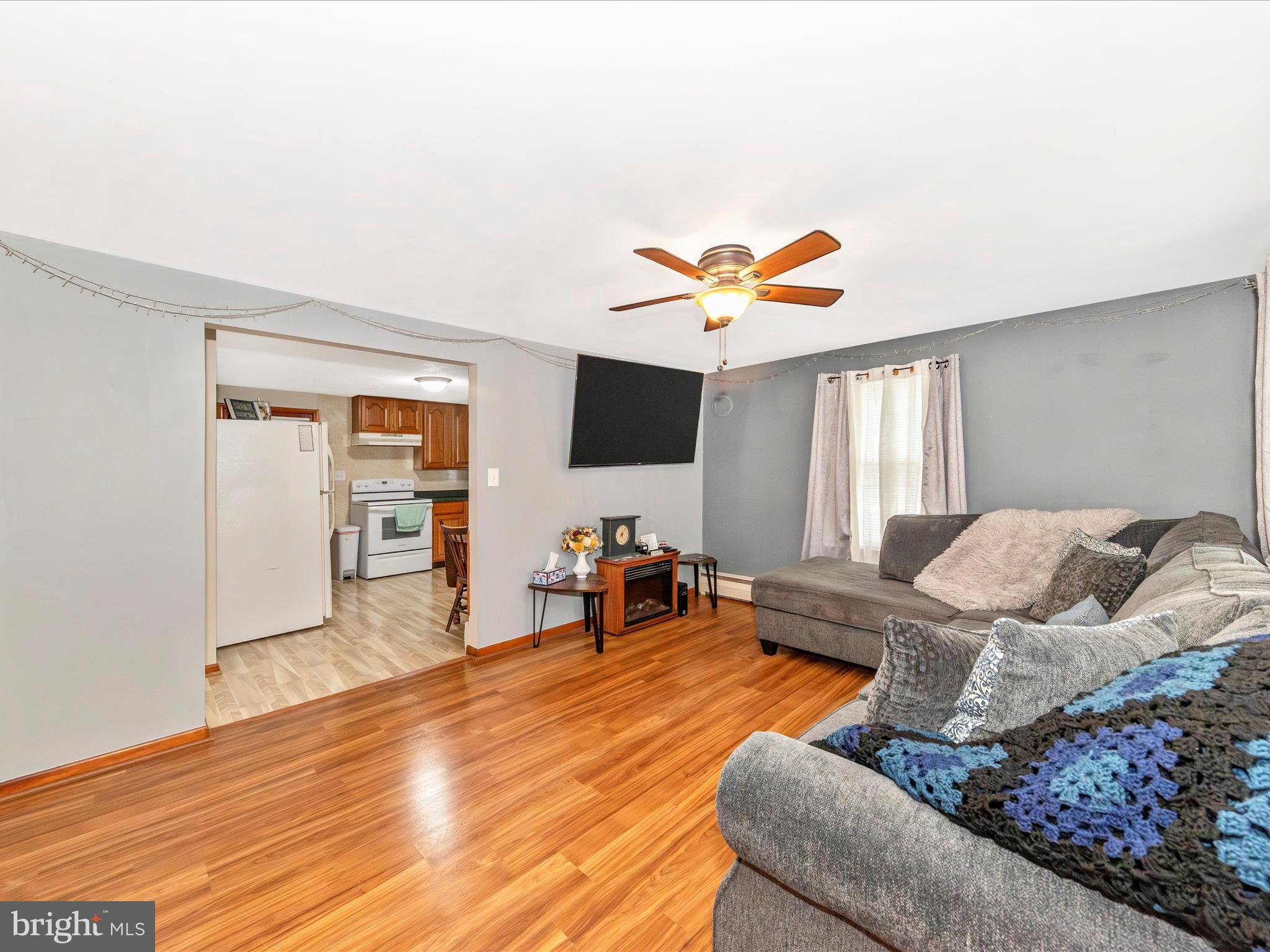 14021 Broadfording Church Road Hagerstown, MD 21740 - Photo 7 of 46 a living room with furniture and wooden floor