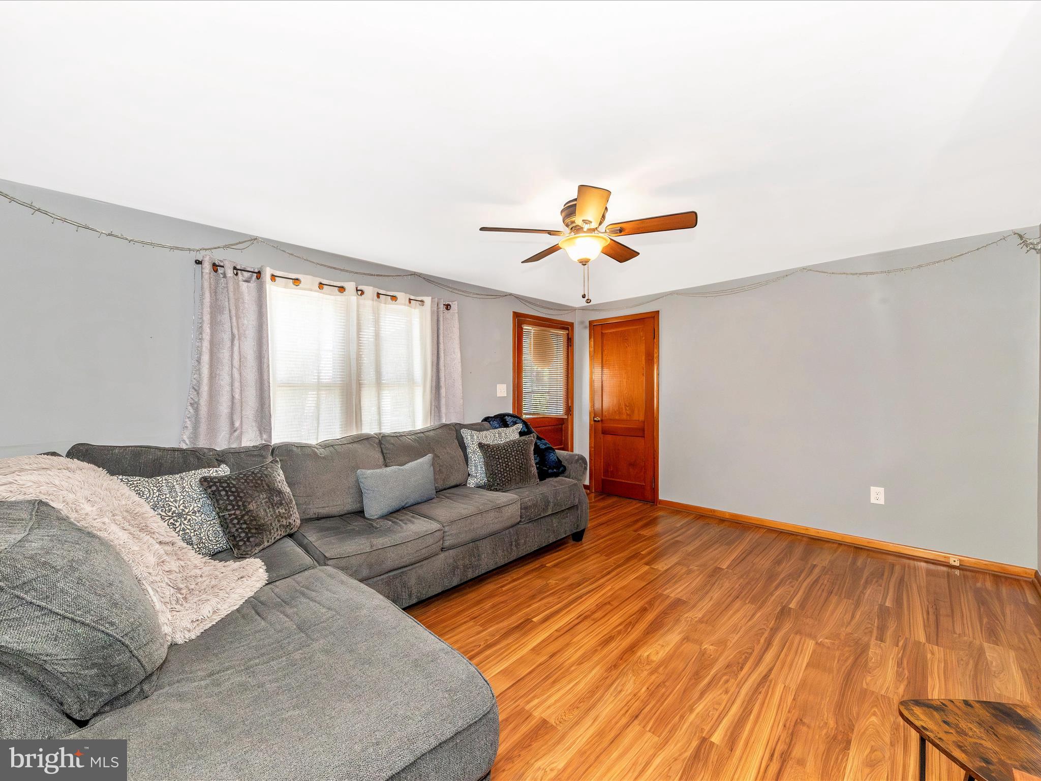 14021 Broadfording Church Road Hagerstown, MD 21740 - Photo 8 of 46 a living room with furniture and a large window