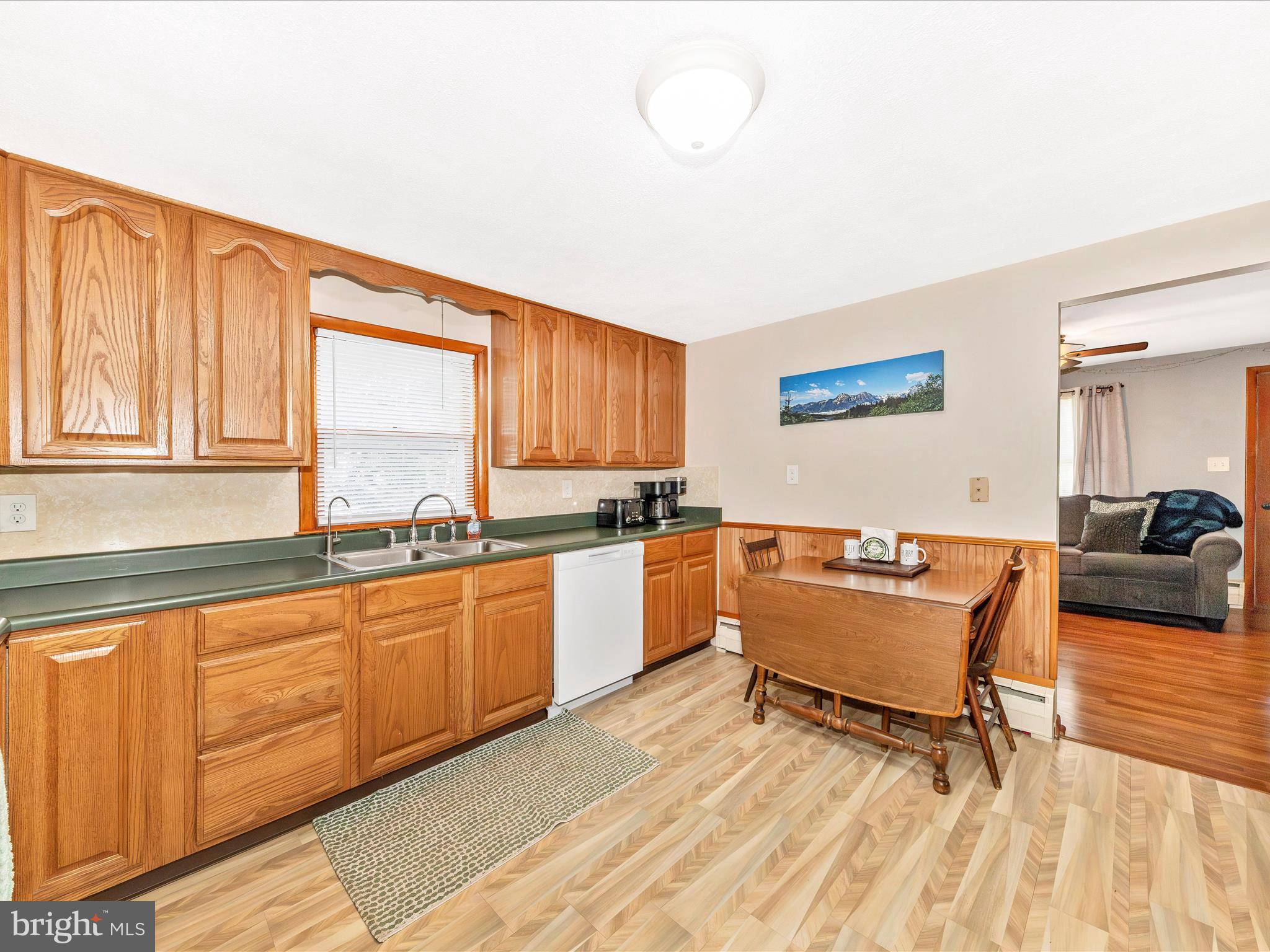14021 Broadfording Church Road Hagerstown, MD 21740 - Photo 10 of 46 a large white kitchen with a large window