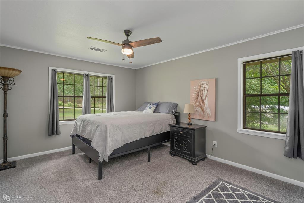 1426 Caney Lake Road Minden, LA 71055 - Photo 17 of 36 Carpeted room with neutral gray walls and white trim
