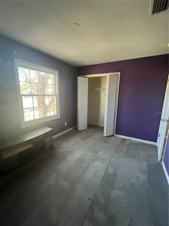 an empty room with windows