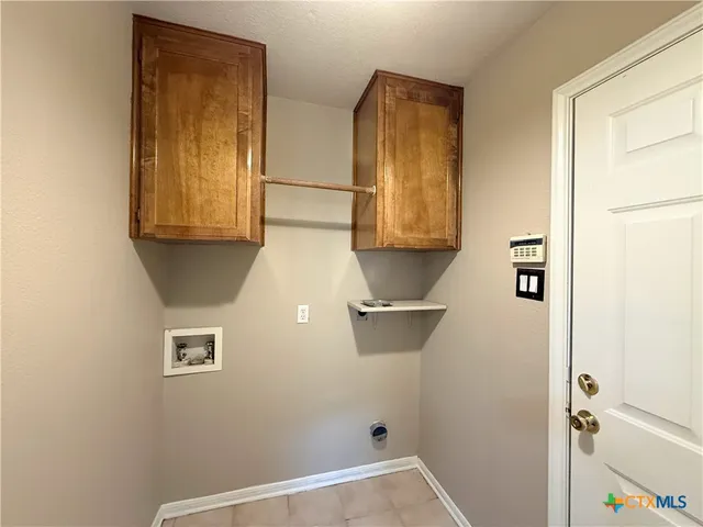 a view of storage and utility room