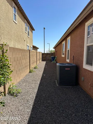 a view of a house with a street