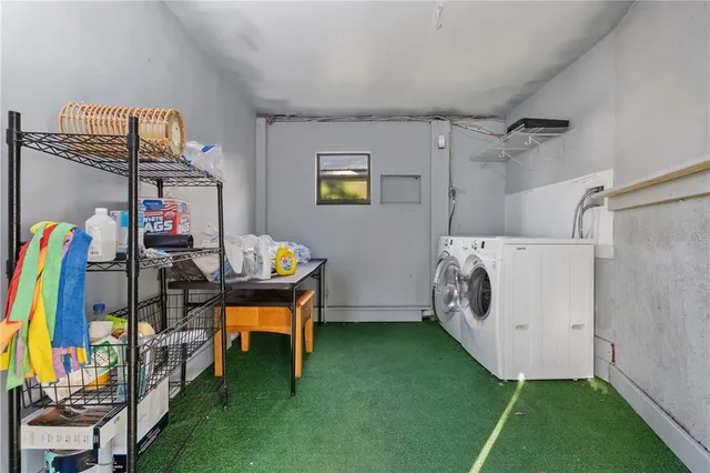 a utility room with dryer and washer